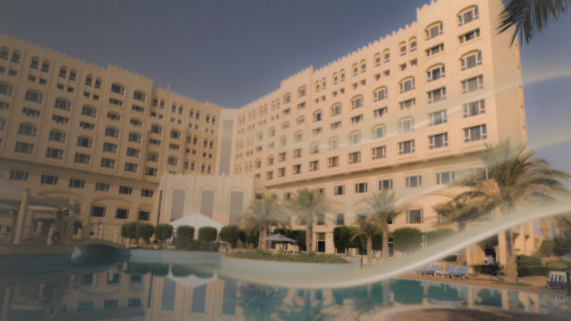 Luxury hotel lobby with warm lighting and cultural decor showcasing hospitality excellence